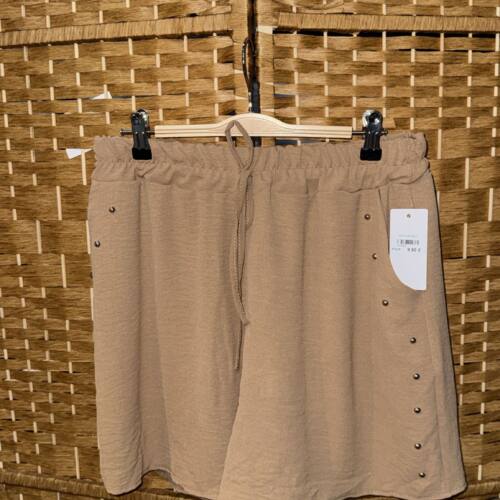 pantalon marron tachuelas